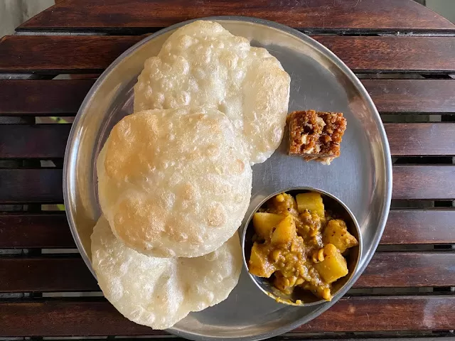 Why you would be lucky to have kochuris (Bengali deep fried puffed breads ) for breakfast on any given Sunday