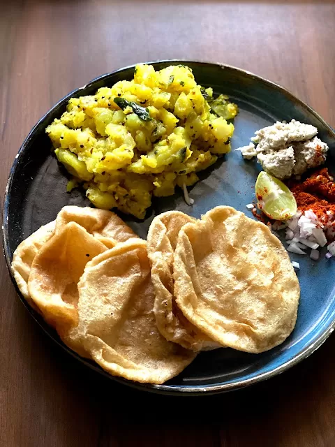 What made a Bengali luchi alur torkari devotee fell in love with the Maharashtrian puri bhaaji?