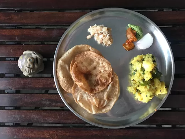 Maharashtrian-styled puri bhaajis for breakfast at Bandra (west). Now who would have imagined that?!
